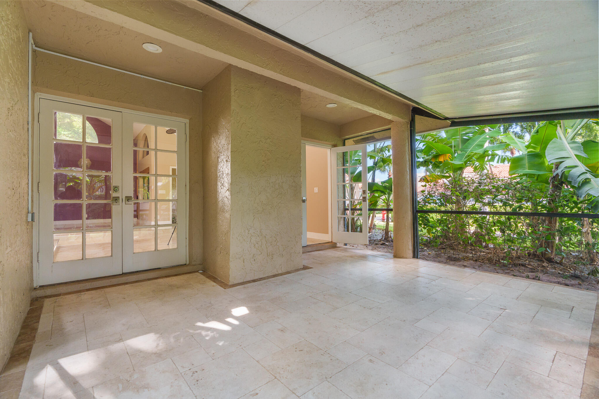 22545 Meridiana Drive Boca Raton, FL 33433 - Photo 15 of 63 a view of an empty room with a fireplace and a large window