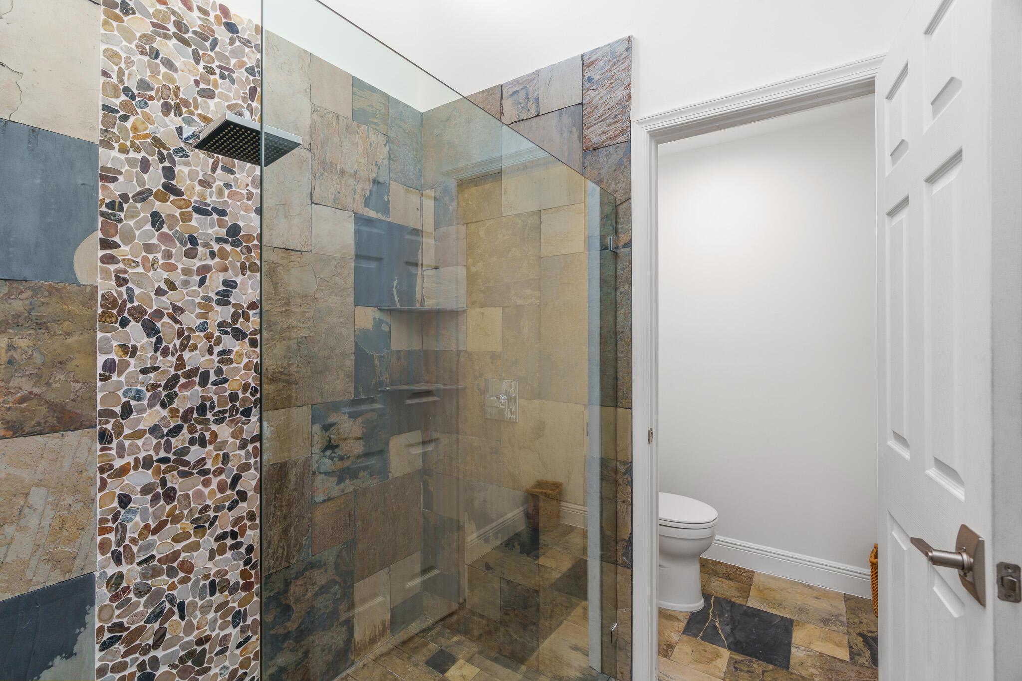 22545 Meridiana Drive Boca Raton, FL 33433 - Photo 28 of 63 a bathroom with a shower toilet and sink