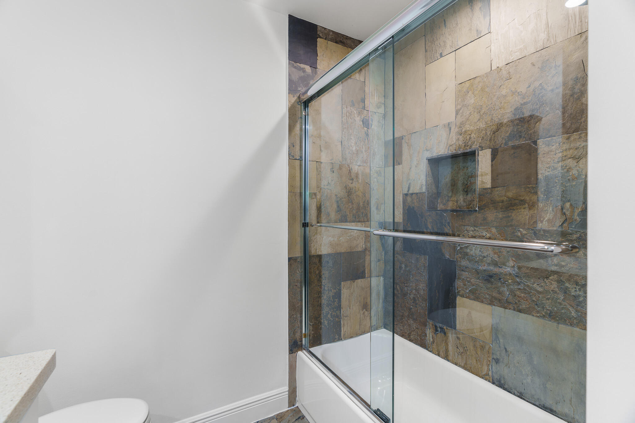 22545 Meridiana Drive Boca Raton, FL 33433 - Photo 36 of 63 a bathroom with a bathtub