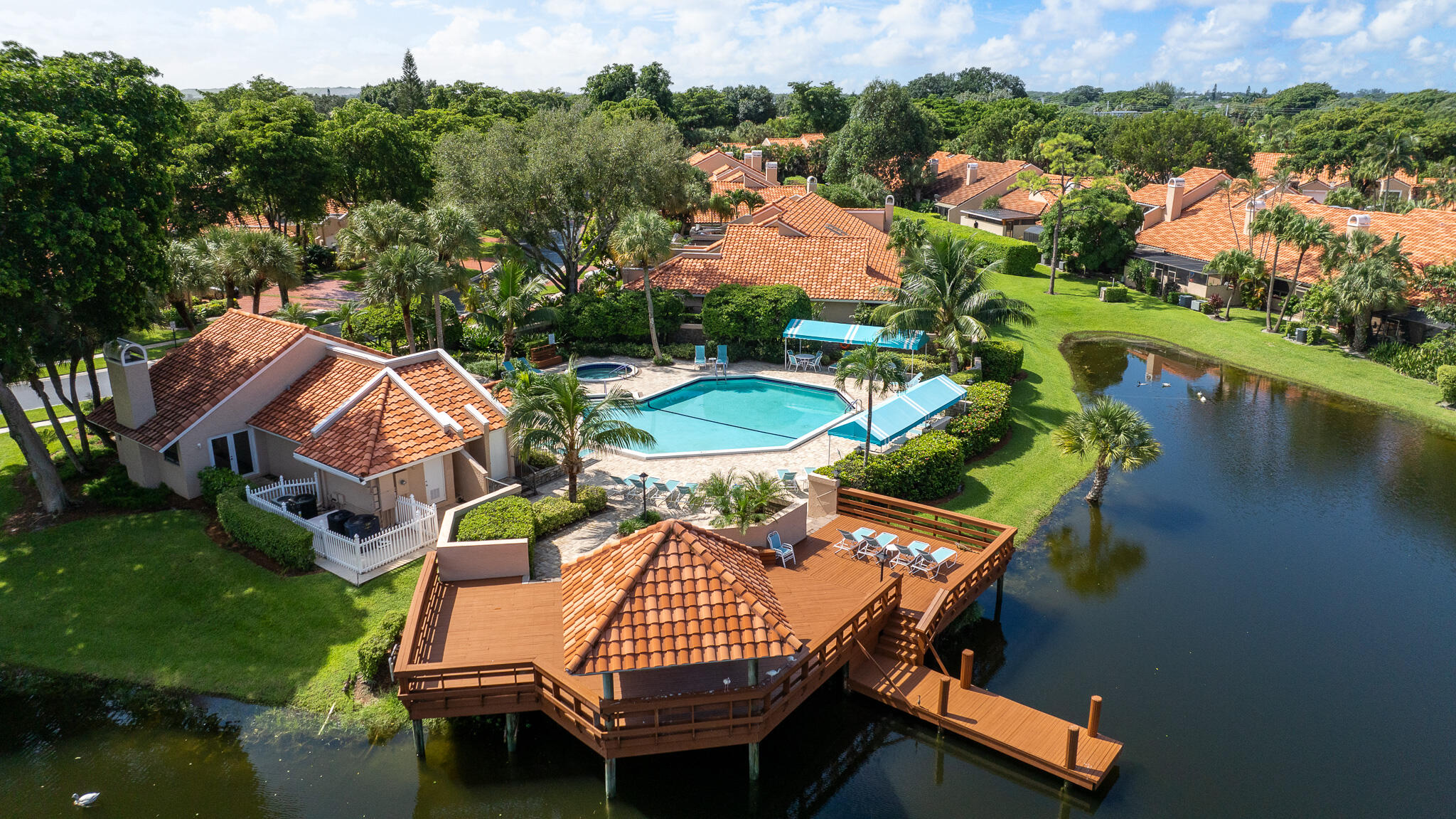 22545 Meridiana Drive Boca Raton, FL 33433 - Photo 44 of 63 an aerial view of a house with swimming pool patio and lake view