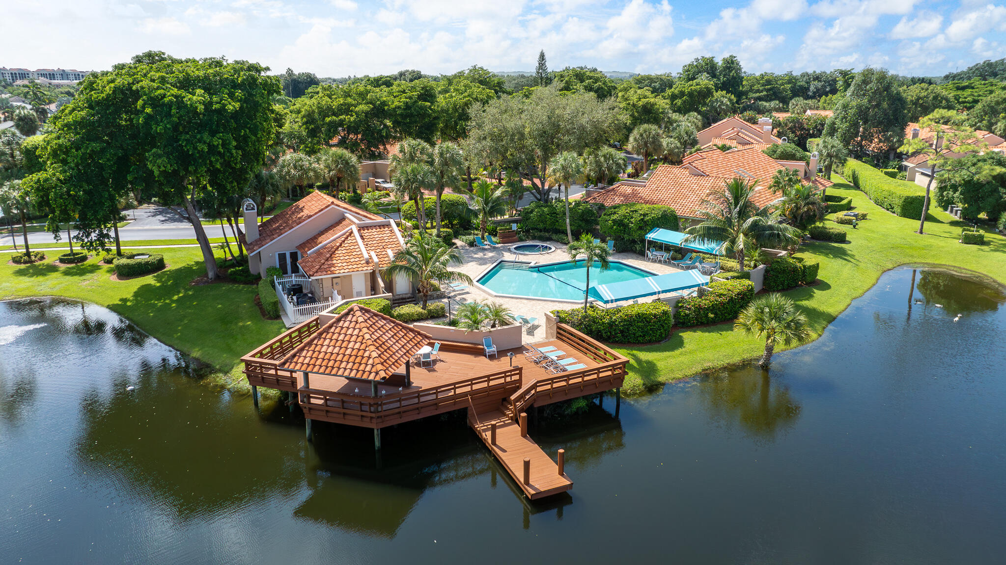 22545 Meridiana Drive Boca Raton, FL 33433 - Photo 45 of 63 an aerial view of a house with swimming pool and lake view