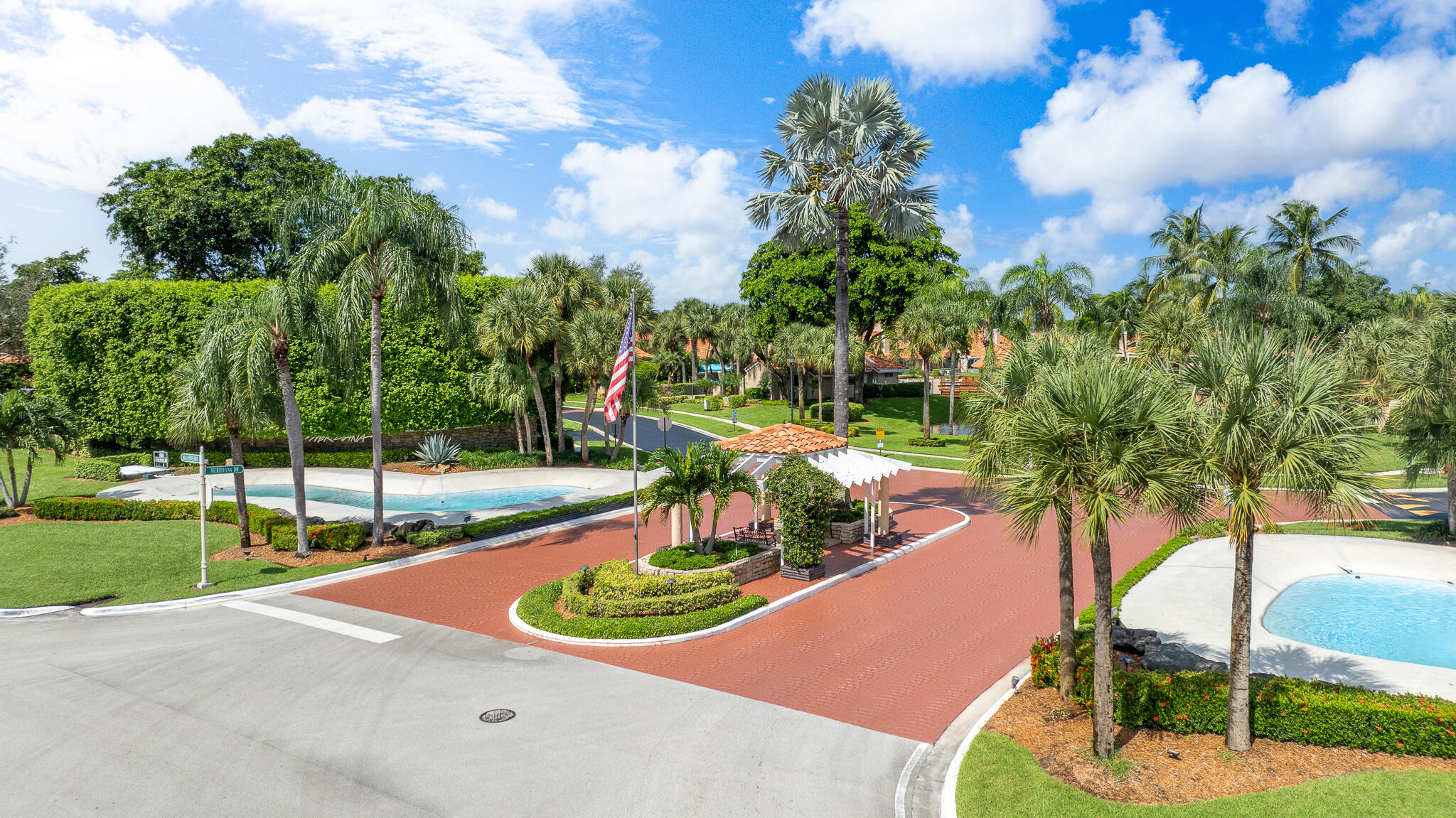 22545 Meridiana Drive Boca Raton, FL 33433 - Photo 49 of 63 a view of a swimming pool with a yard