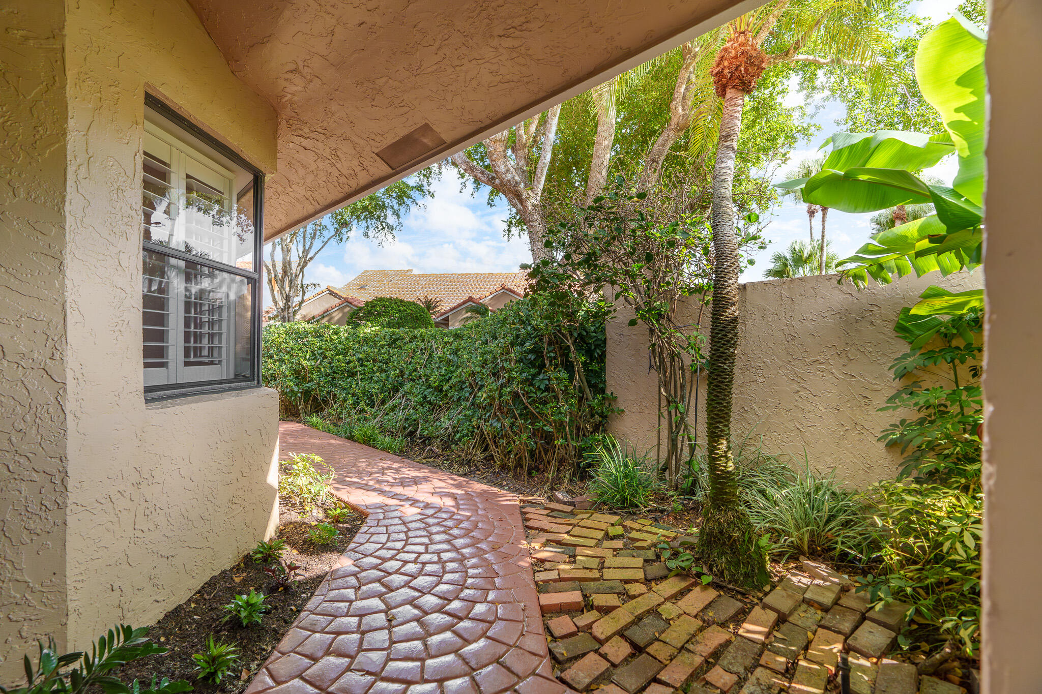 22545 Meridiana Drive Boca Raton, FL 33433 - Photo 63 of 63 a view of a back yard from a patio