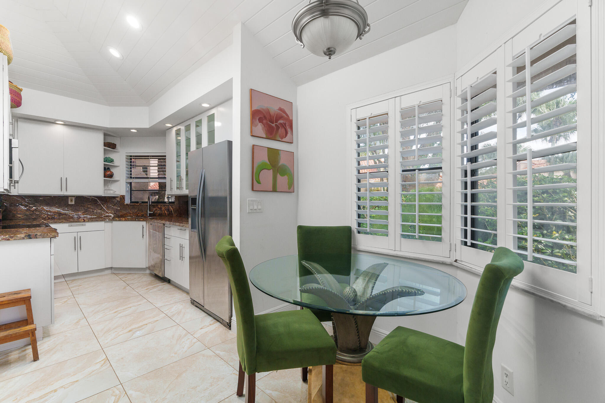 22545 Meridiana Drive Boca Raton, FL 33433 - Photo 7 of 63 a view of a dining room with furniture and a window