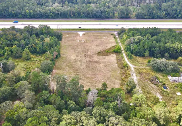 a view of a yard with an outdoor space