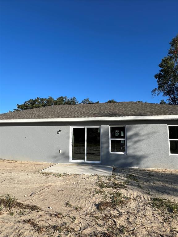 20050 Southwest 80th Pl Road Dunnellon, FL 34431 - Photo 10 of 10 a view of a house with a backyard