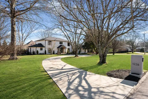 a building with trees in the background