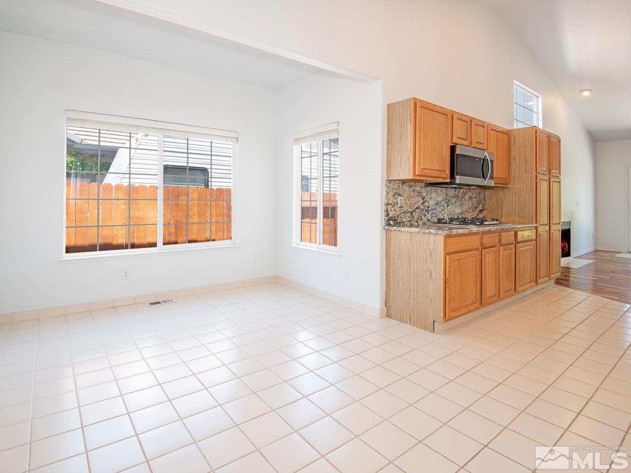 6550 Fieldbrook Circle Reno, NV 89519 - Photo 6 of 21 a view of a kitchen with a sink cabinets and a window