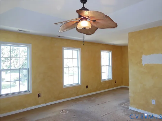 a view of a room with a chandelier