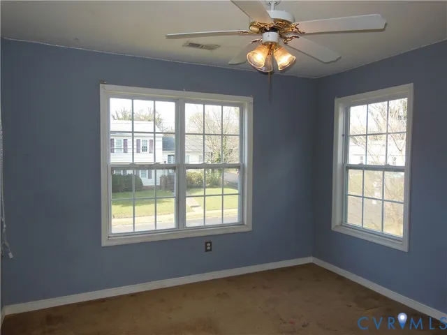 a window in an empty room with a window