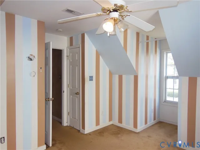 a view of a hallway with front door