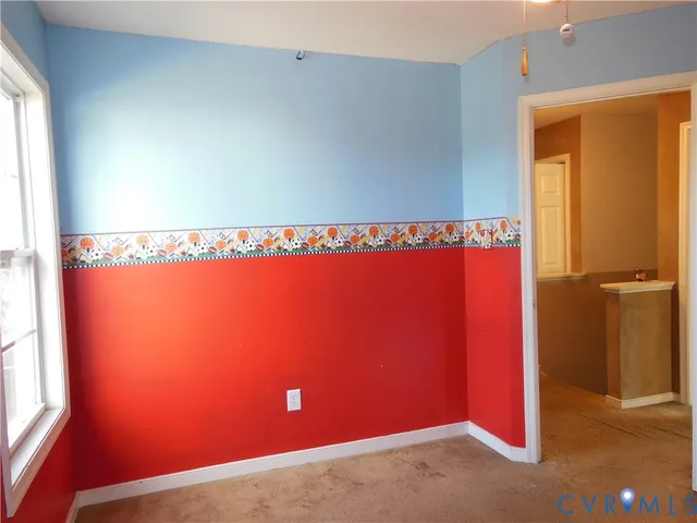 a view of a room with a large window