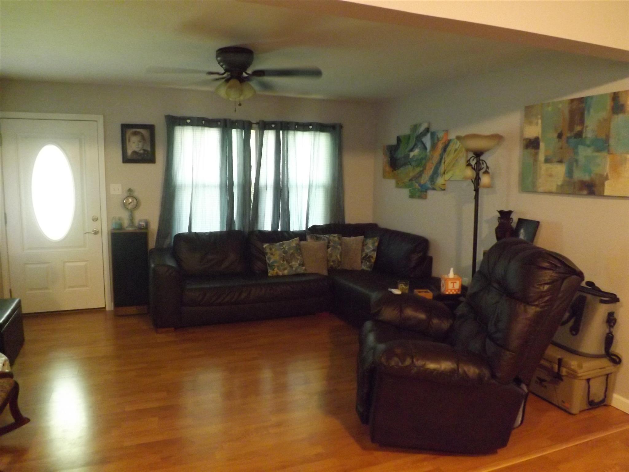 1397 Oak Grove Road Goodspring, TN 38460 - Photo 11 of 25 a living room with furniture and a large window