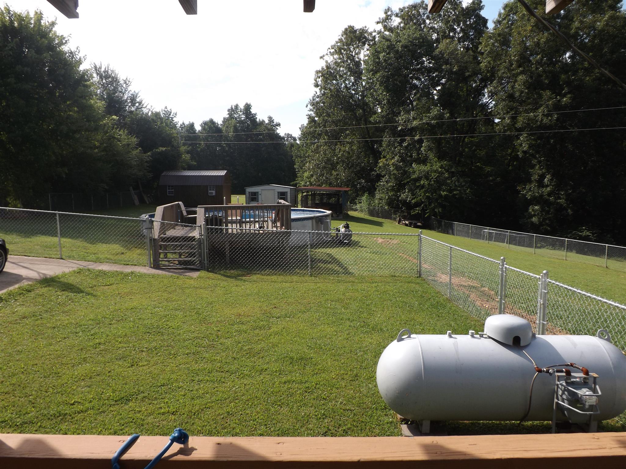1397 Oak Grove Road Goodspring, TN 38460 - Photo 20 of 25 a view of a swimming pool and lounge chairs