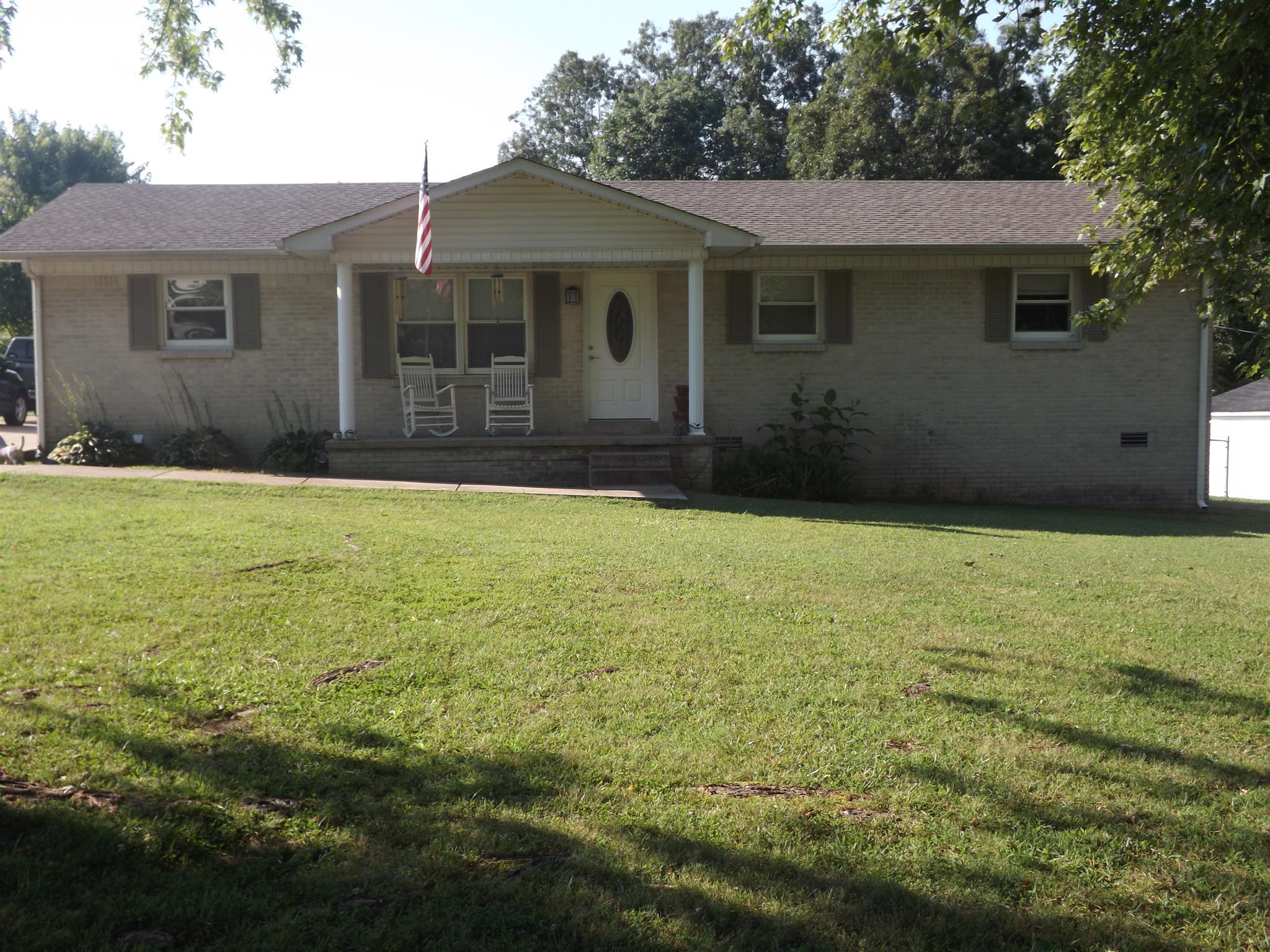 1397 Oak Grove Road Goodspring, TN 38460 - Photo 3 of 25 a front view of a house with a yard
