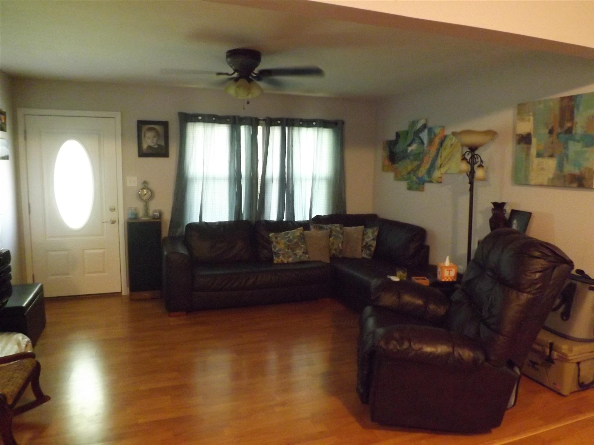 1397 Oak Grove Road Goodspring, TN 38460 - Photo 10 of 25 a living room with furniture and a mirror