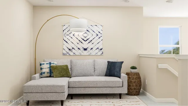 a living room with furniture and a couch