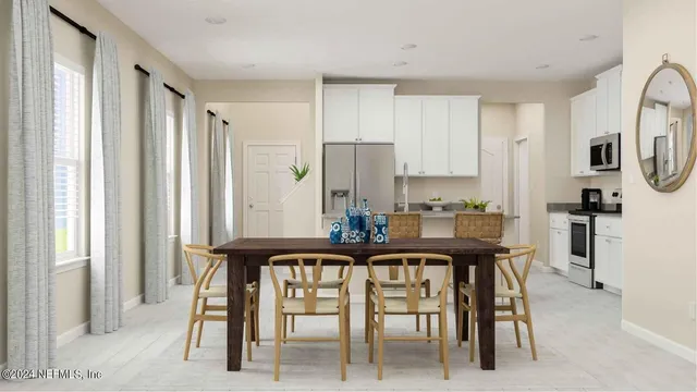 a view of a dining room with furniture
