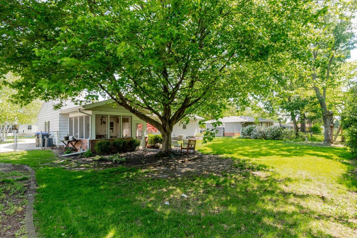 302 Radliff Road Bloomington, IL 61701 - Photo 31 of 35 a front view of house with yard and green space