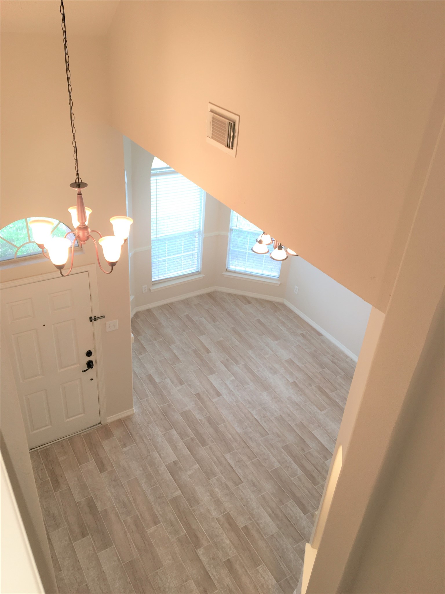 2214 Valley View Crossing Conroe, TX 77304 - Photo 13 of 23 a view of a room with wooden floor