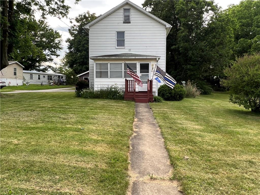 665 West Back Street Rimersburg, PA 16248 - Photo 1 of 14 a front view of a house with yard porch and green space