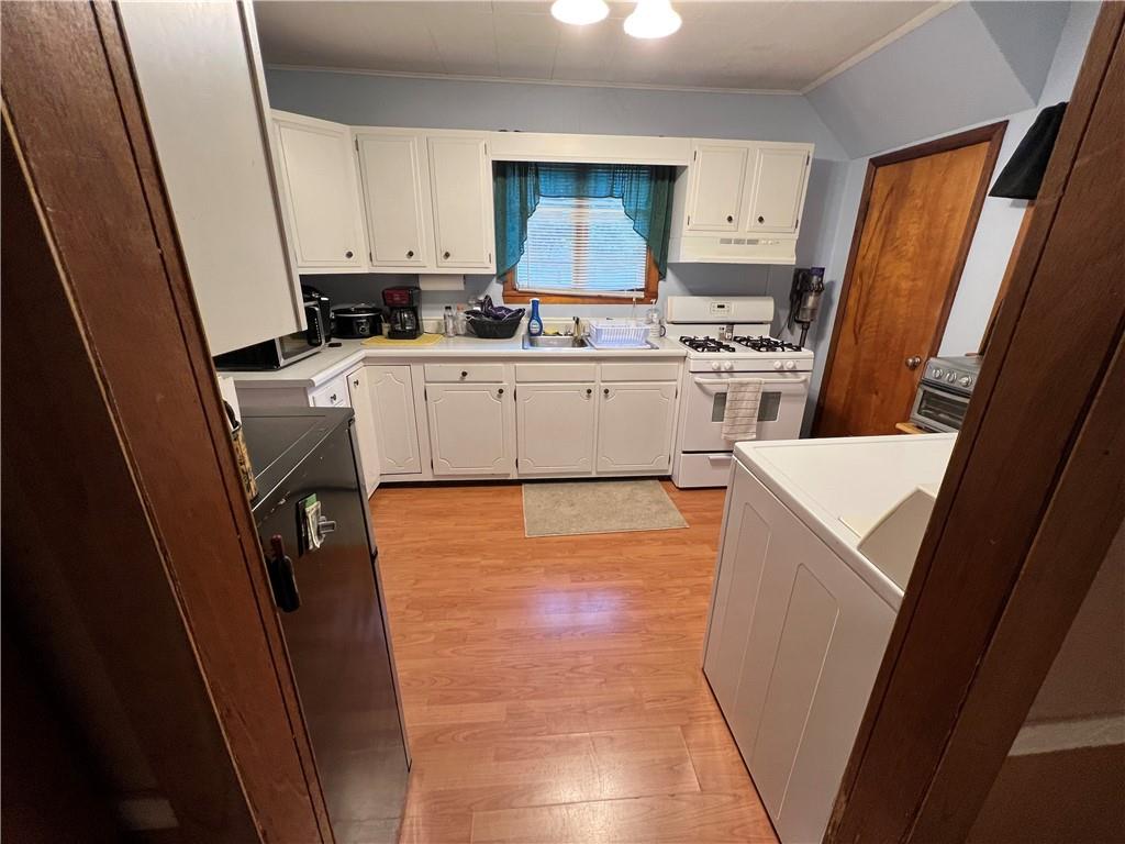 665 West Back Street Rimersburg, PA 16248 - Photo 6 of 14 a utility room with sink washer and dryer