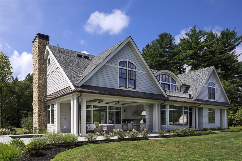 30 Field Road Sudbury, MA 01776 - Photo 2 of 38 a front view of a house with garden