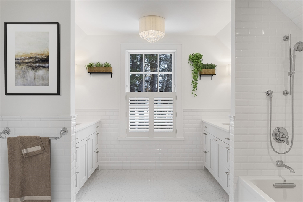 30 Field Road Sudbury, MA 01776 - Photo 21 of 38 a bathroom with a bathtub and shower