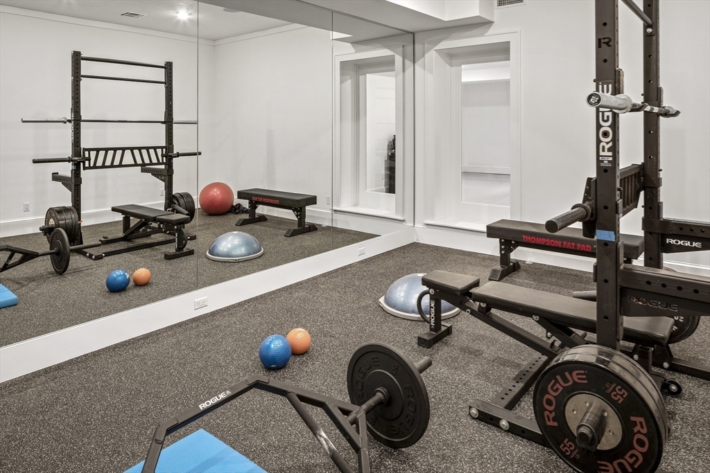 30 Field Road Sudbury, MA 01776 - Photo 22 of 38 a view of a room with gym equipment