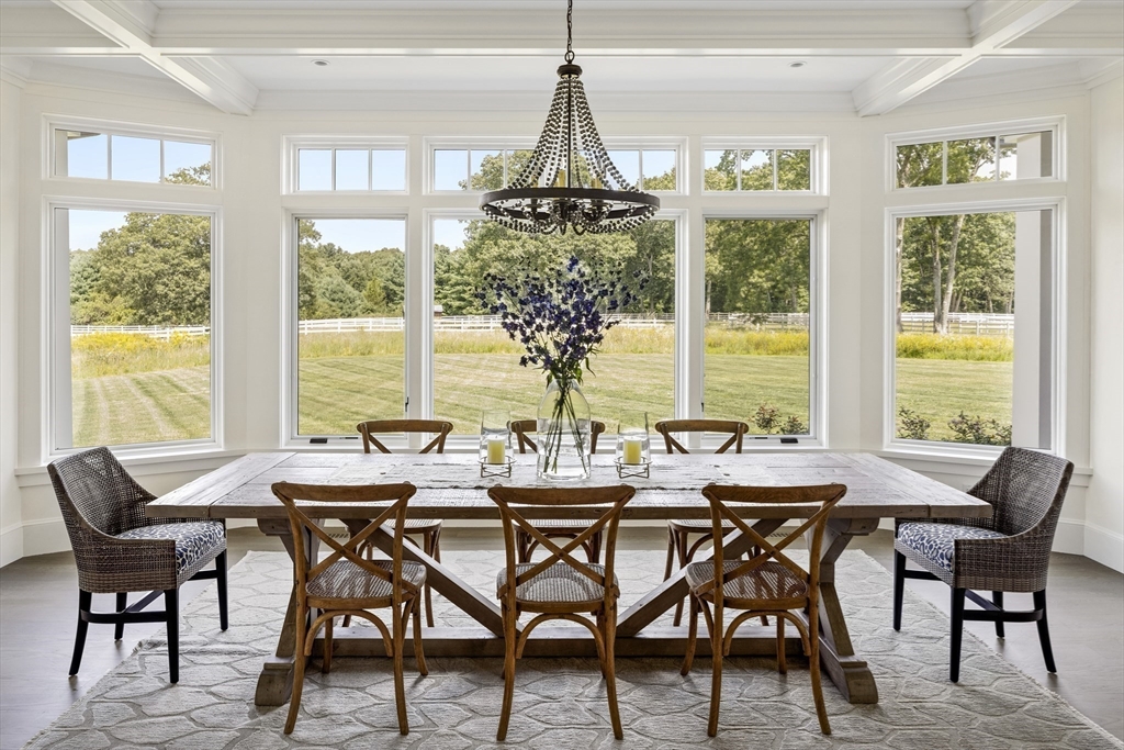 30 Field Road Sudbury, MA 01776 - Photo 5 of 38 a view of a dining room with furniture window and outside view