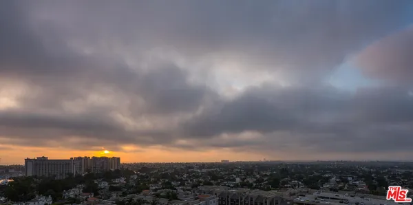 a living room with couches and furniture