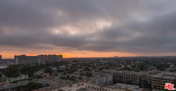 a view of swimming pool with outdoor seating