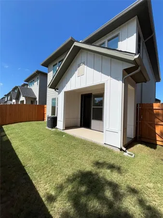 a house with yard in front of it