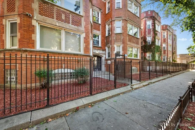 a view of a brick building from a balcony