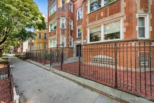 a view of a building with a street
