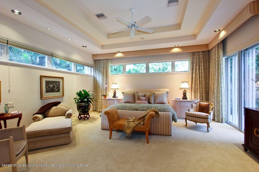 210 Wells Road Palm Beach, FL 33480 - Photo 11 of 12 a living room with furniture and a large window