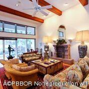 210 Wells Road Palm Beach, FL 33480 - Photo 8 of 12 a living room with furniture and a large window