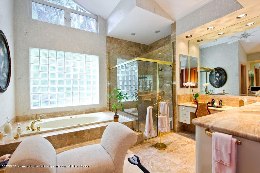 210 Wells Road Palm Beach, FL 33480 - Photo 10 of 12 a living room with furniture and a large window