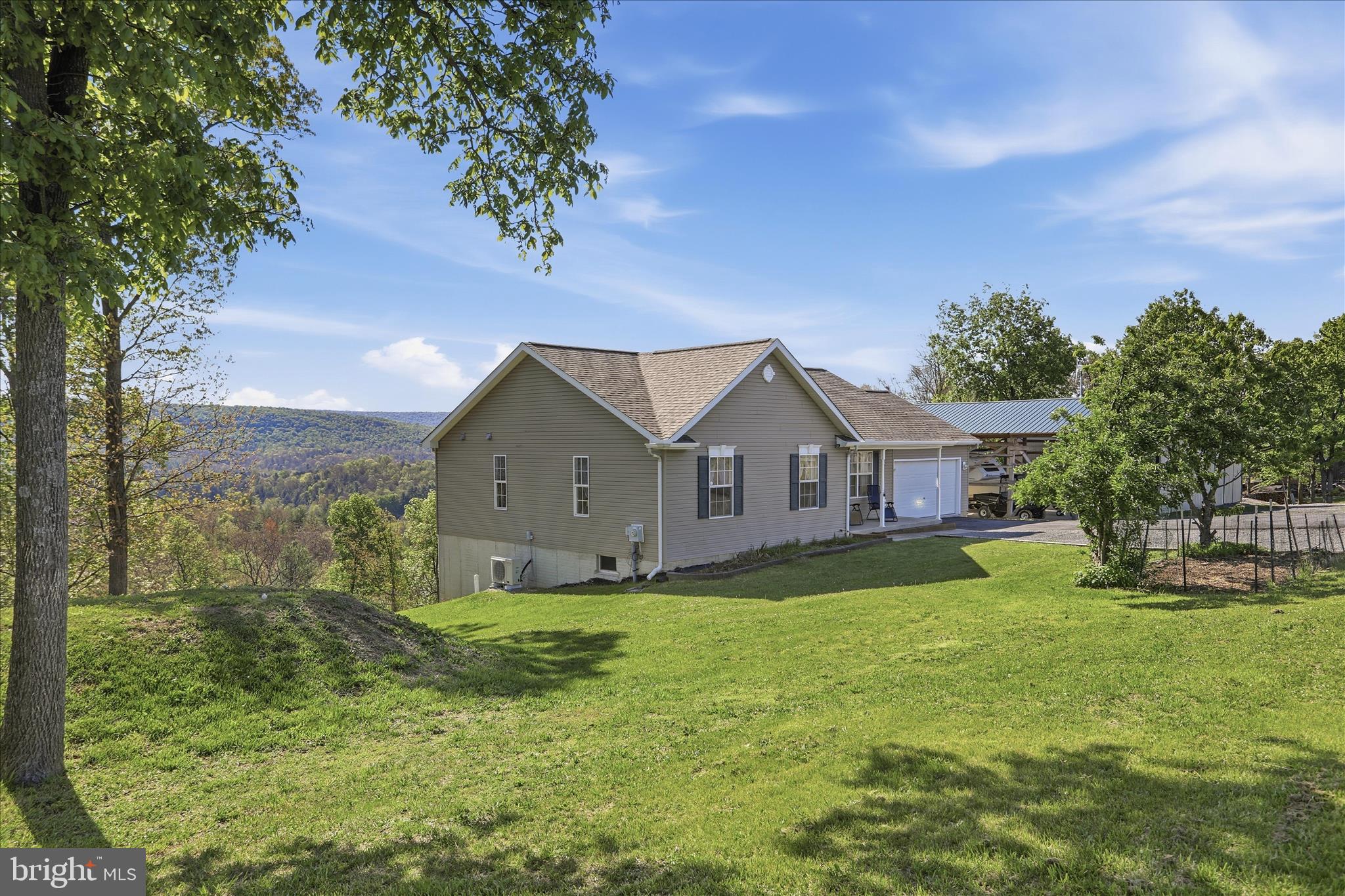 9580 Timber Ridge Road Big Cove Tannery, PA 17212 - Photo 2 of 56 a view of a house with a big yard