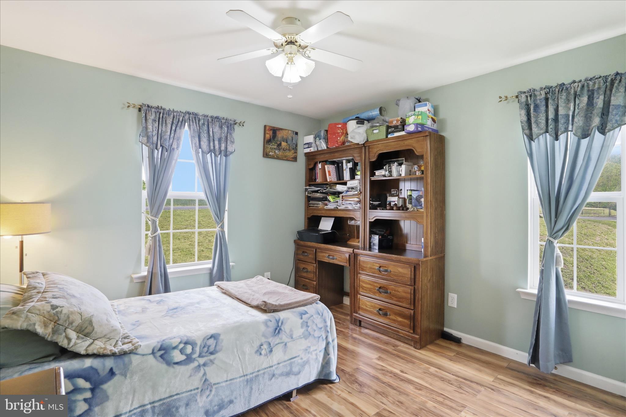 9580 Timber Ridge Road Big Cove Tannery, PA 17212 - Photo 21 of 56 a bedroom with a bed cabinets and a window