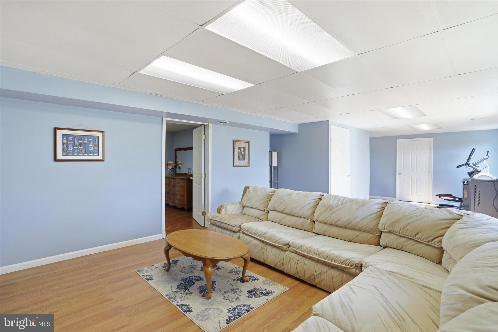 9580 Timber Ridge Road Big Cove Tannery, PA 17212 - Photo 28 of 56 a living room with furniture and a wooden floor