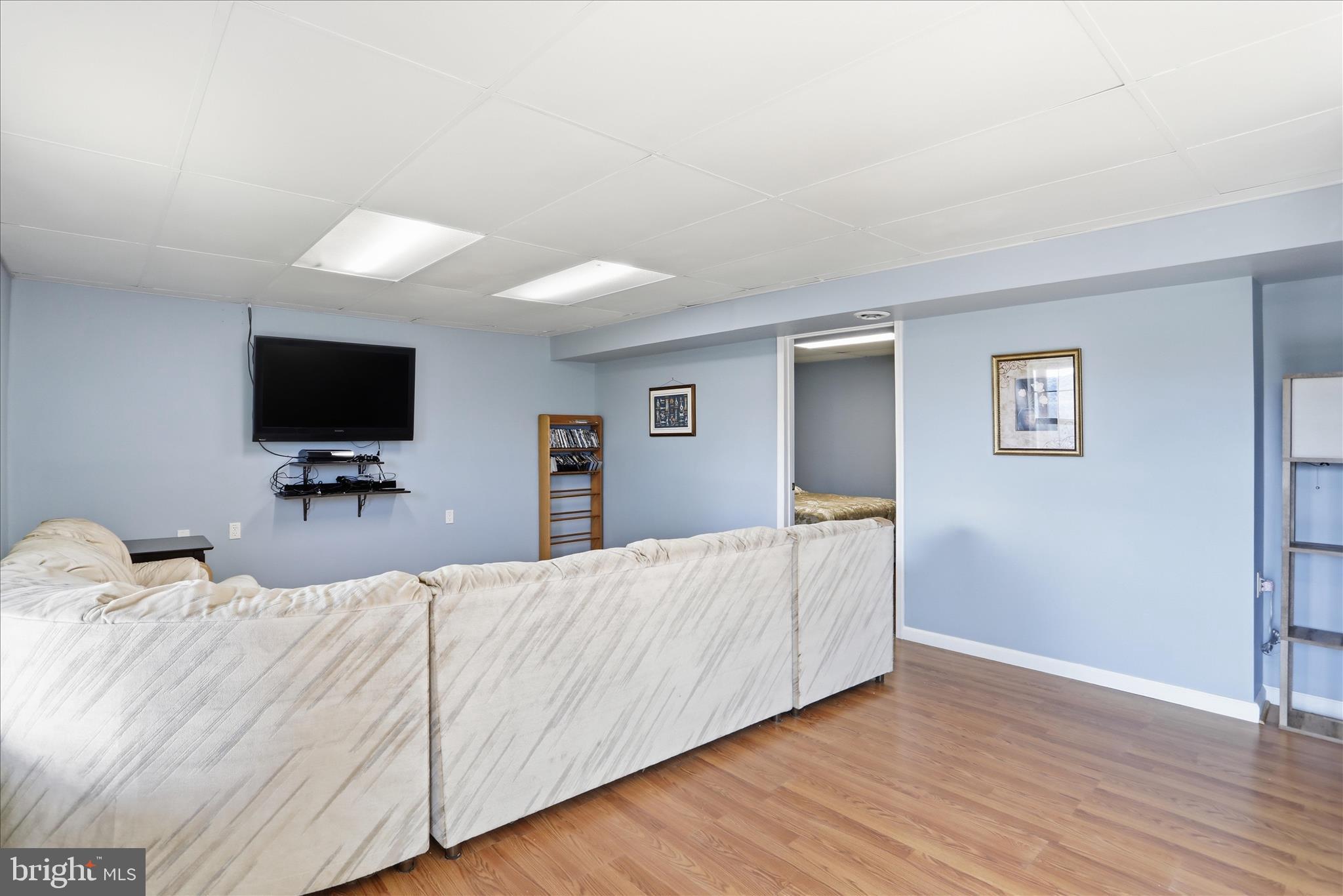 9580 Timber Ridge Road Big Cove Tannery, PA 17212 - Photo 29 of 56 a room with a bed and a flat screen tv