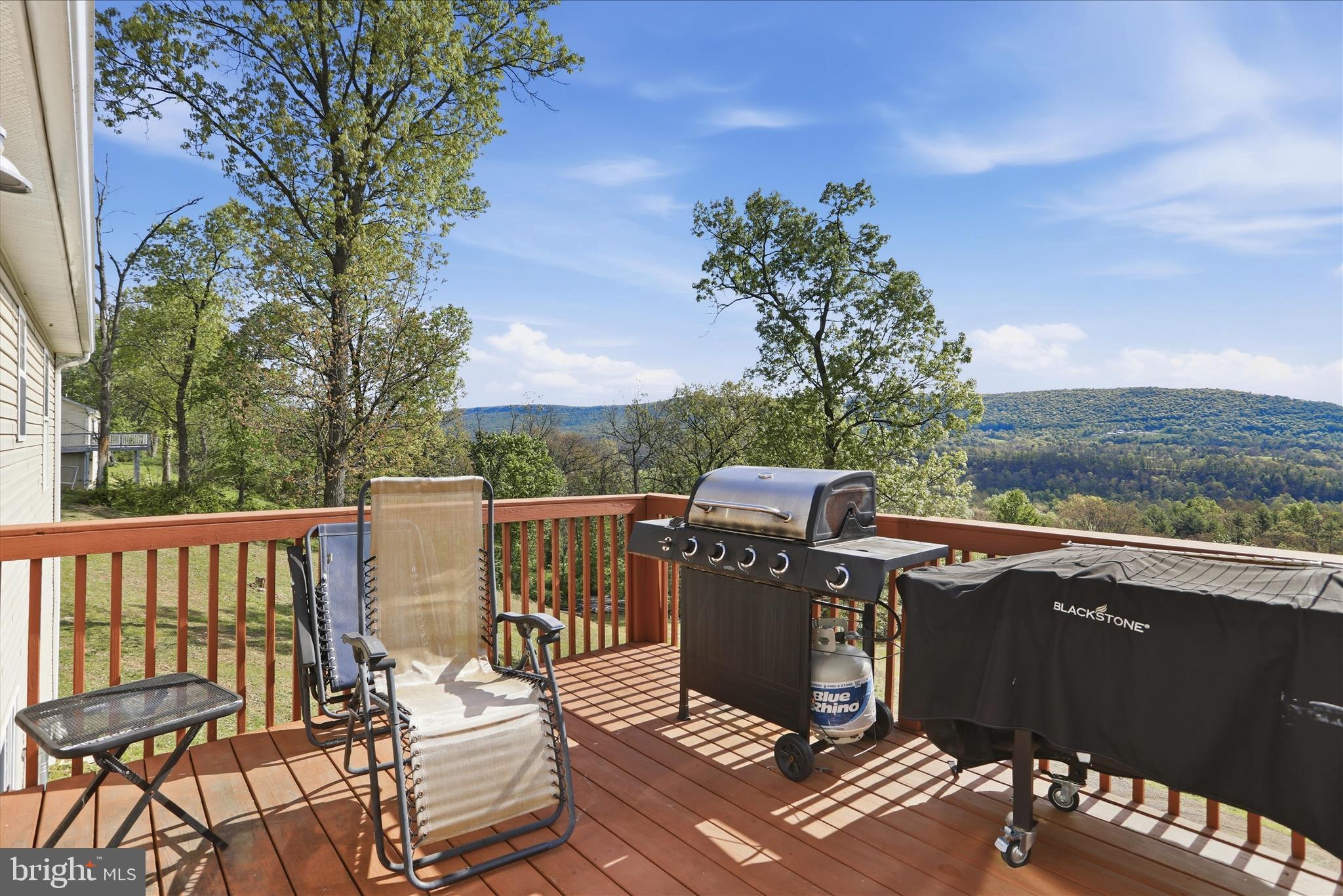 9580 Timber Ridge Road Big Cove Tannery, PA 17212 - Photo 35 of 56 a view of a balcony with wooden floor and fence