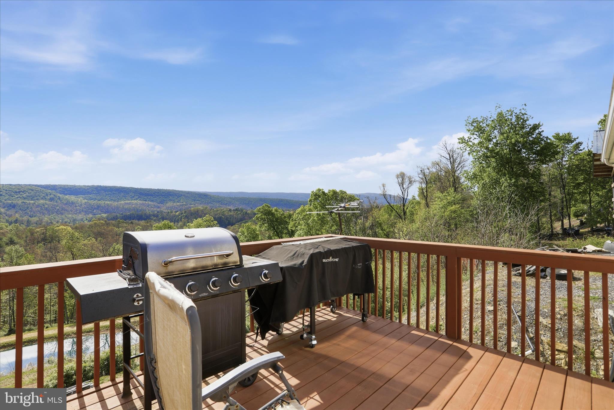 9580 Timber Ridge Road Big Cove Tannery, PA 17212 - Photo 36 of 56 a view of a balcony with wooden floor and fence