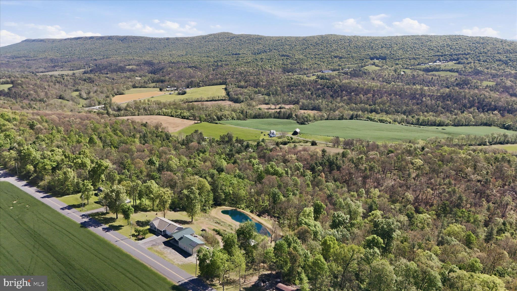 9580 Timber Ridge Road Big Cove Tannery, PA 17212 - Photo 49 of 56 an aerial view of a houses with a yard