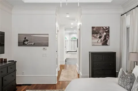 a living room with lots of furniture and a flat screen tv