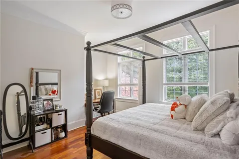 a kitchen with stainless steel appliances granite countertop a sink and a refrigerator