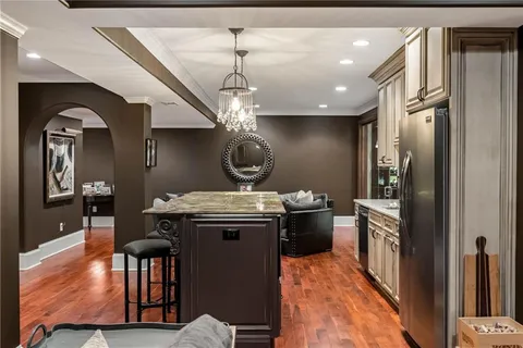 an aerial view of a house with outdoor space and street view