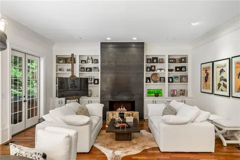 a kitchen with stainless steel appliances granite countertop a stove and a refrigerator