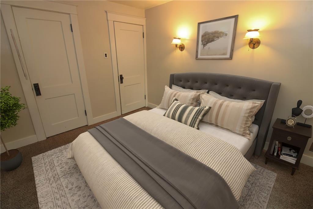 1443 State Avenue Coraopolis, PA 15108 - Photo 11 of 20 a bedroom with a bed and a painting on the wall